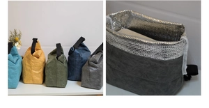 Detail of insulated lunch bag with Dupont paper texture and thermal silver foil lining