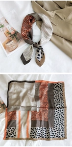 Satin silk scarf with leopard and geometric prints shown flat and styled on trench coat