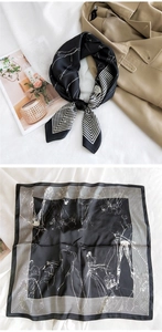 Detail of silk-textured square scarf featuring abstract portrait sketch and stripes