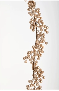 Détail d'une guirlande de baies artificielles champagne doré avec paillettes pour Noël