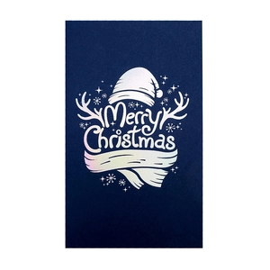 Blue Christmas card with silver laser foil Merry Christmas lettering and festive motifs