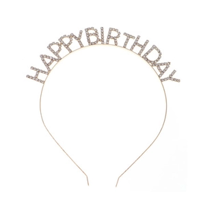 Macro shot of gold headband featuring sparkling rhinestone HAPPY BIRTHDAY letter design