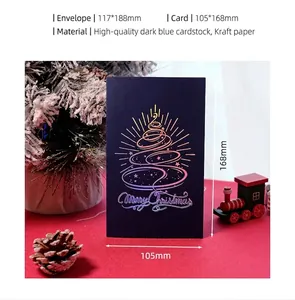 Detail of navy blue Christmas card with gradient gold foil tree and rustic pine cone decor