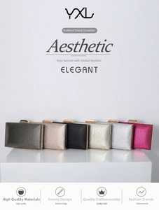 Detail of evening clutch bags showing V-shaped woven texture and metal clasp closure