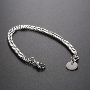 Minimalist silver curb chain bracelet with lobster clasp and smooth round pendant