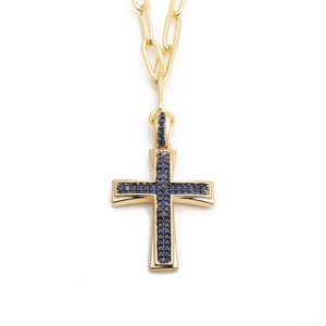 Hip hop gold chain necklace with a cross pendant featuring blue cubic zirconia