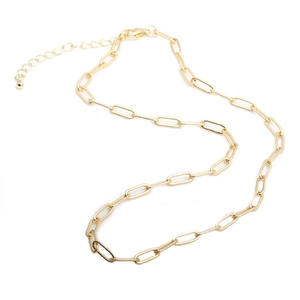 Hip hop cross necklace with colorful zircon in gold finish on a minimalist white background