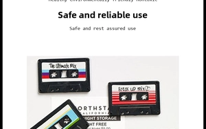 Close-up of retro cassette tape magnets featuring multi-color stripes and handwritten text