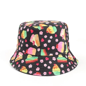 Detail of black bucket hat with colorful ice cream cake and cherry blossom print fabric