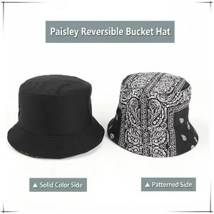 Reversible Paisley bucket hat in black and white cotton with wide brim sun protection