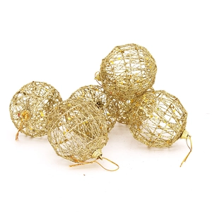 Detailed view of 5 glittery hollow gold wire Christmas tree hanging ornaments