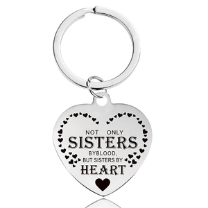 Polished heart keychain with engraved quote Not Only Sisters By Blood But Sisters By Heart