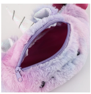 Detail view of the plush unicorn bag showing the interior compartment and gradient texture