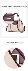 Detail view of large tote bag with rear zipper pocket and beige-burgundy contrast color
