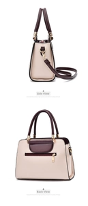 Detailed view of the contrast color handbag with rear zipper pocket and gold hardware