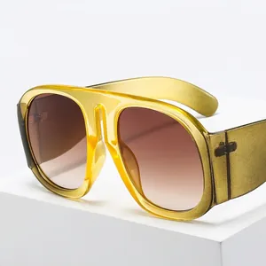 Retro oversized square sunglasses with yellow transparent frames and brown gradient lenses