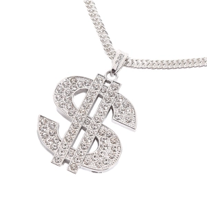Detailed close-up of a silver-toned hip hop dollar sign pendant with sparkling rhinestones