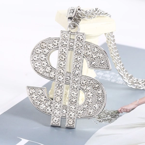 Detailed view of silver dollar sign pendant with sparkling diamonds and twisted chain
