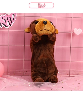 Detail of cute brown plush dog pencil case with creative cartoon embroidery and zipper