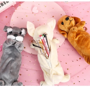 Detailed interior of cute plush dog pencil cases showing large storage for pens and glasses