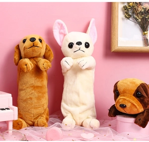 Detailed plush dog pencil cases in dachshund and french bulldog styles on pink background