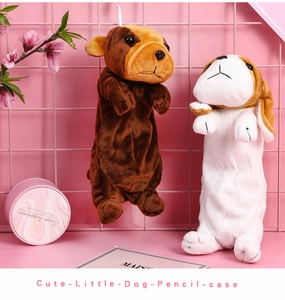 Cute plush dog pencil cases in brown and white shown against a pink grid background