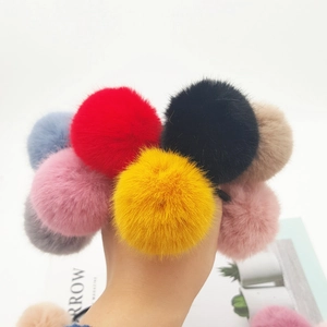 Colorful fluffy faux fur ball hair ties in multiple vibrant shades for women accessories