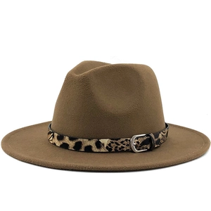 Close-up of the leopard print belt and silver buckle on the brown wool fedora hat
