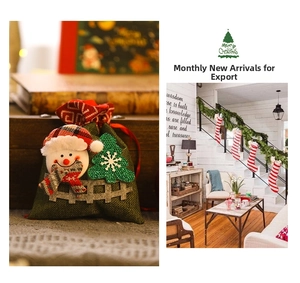 Detail of green burlap Christmas gift bag featuring a 3D snowman and felt tree applique
