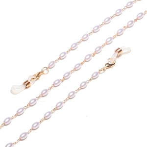 Golden eyewear chain featuring pink rice pearls and silicone anti-slip loops