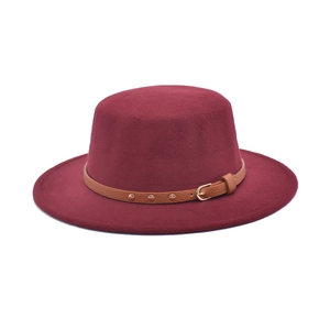 Detail of burgundy flat top fedora with brown leather belt and metallic buckle