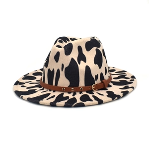 Cow print wool fedora hat with wide brim and studded brown leather band