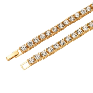 Close-up of gold-plated tennis chain with secure fold-over clasp and brilliant zircon stones