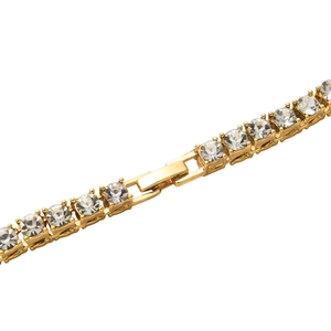 Close-up of gold-plated tennis chain with clear zircon stones and a fold-over clasp