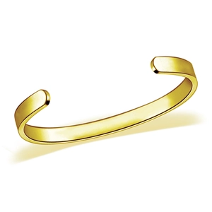 Detailed view of polished golden C-shape stainless steel cuff bracelet with smooth finish