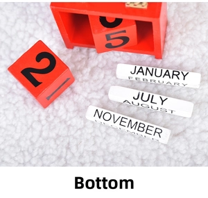 Detailed view of red wooden Christmas advent calendar with DIY blocks on white texture