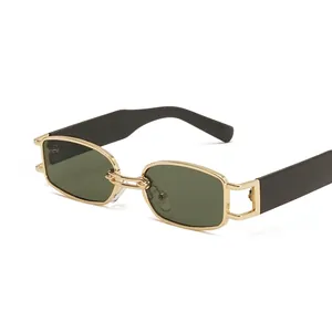 Retro irregular rectangle sunglasses with gold metal frame and green tinted lenses