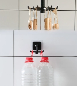 Kitchen wall-mount rotating 6-claw hook showing extreme load-bearing capacity