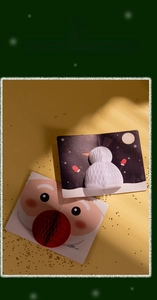 Detail of 3D honeycomb Christmas card with Santa and snowman on starry background