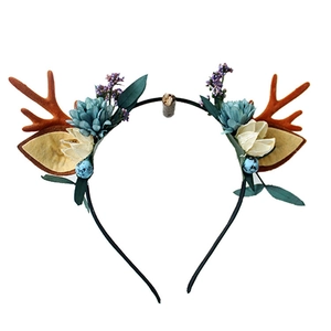 Christmas antler headband with faux flowers and berries for festive photography