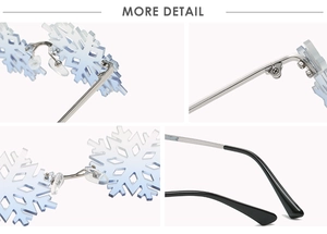 Detail view of snowflake sunglasses with blue gradient lenses and silver metal hinges