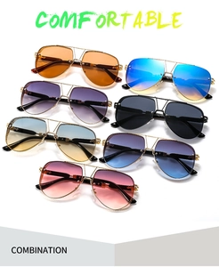 Collection of seven colorful aviator sunglasses with metal frames in multiple lens tints