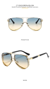 Detail view of gold aviator sunglasses with gradient lenses and textured metal frames