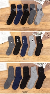 Close-up of thick knitted crew socks in argyle and diamond patterns for winter comfort