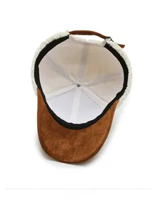 Detail view of the baseball cap's inner lining and adjustable strap with teddy fleece texture