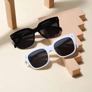 Classic black and white retro oversized square sunglasses with metal dot details