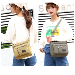 Canvas crossbody bag shown in khaki and army green with multiple zipper pockets