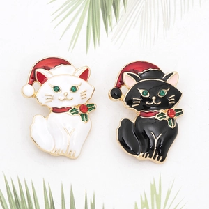 Cute black and white Christmas cat brooches with enamel finish and crystal details