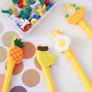 Set of 4 cute yellow cartoon gel pens with fruit and floral silicone toppers