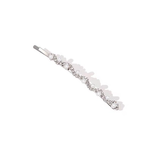 Elegant wave hair clip with white pearls and sparkling rhinestones on silver metal base